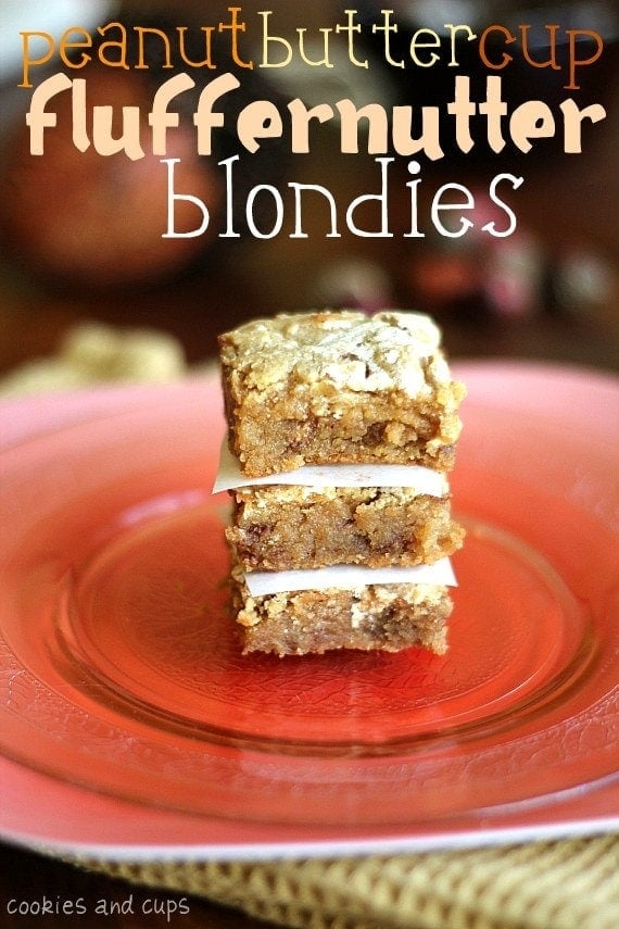 Peanut Butter fluffernutter blondies stacked on a plate