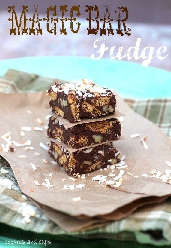 Three pieces of Magic Bar Fudge stacked on a napkin