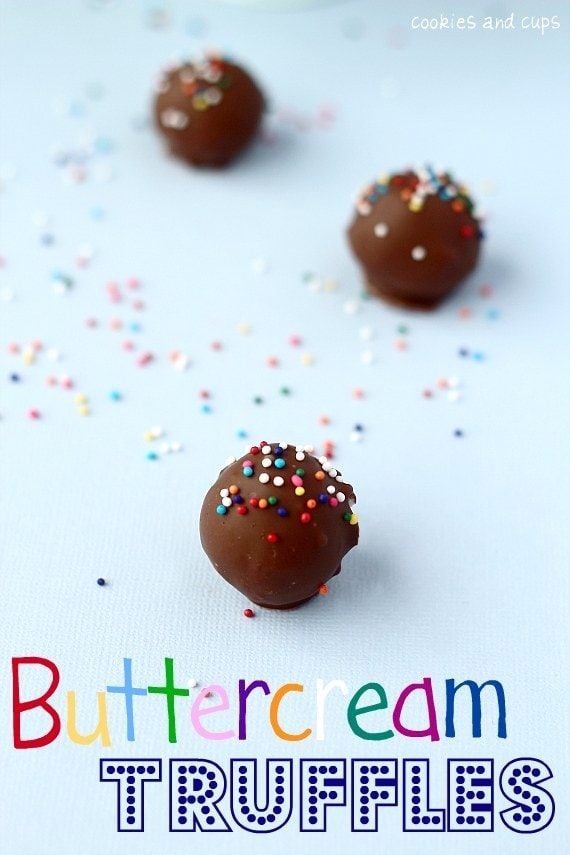 Three chocolate covered buttercream truffles with rainbow sprinkles
