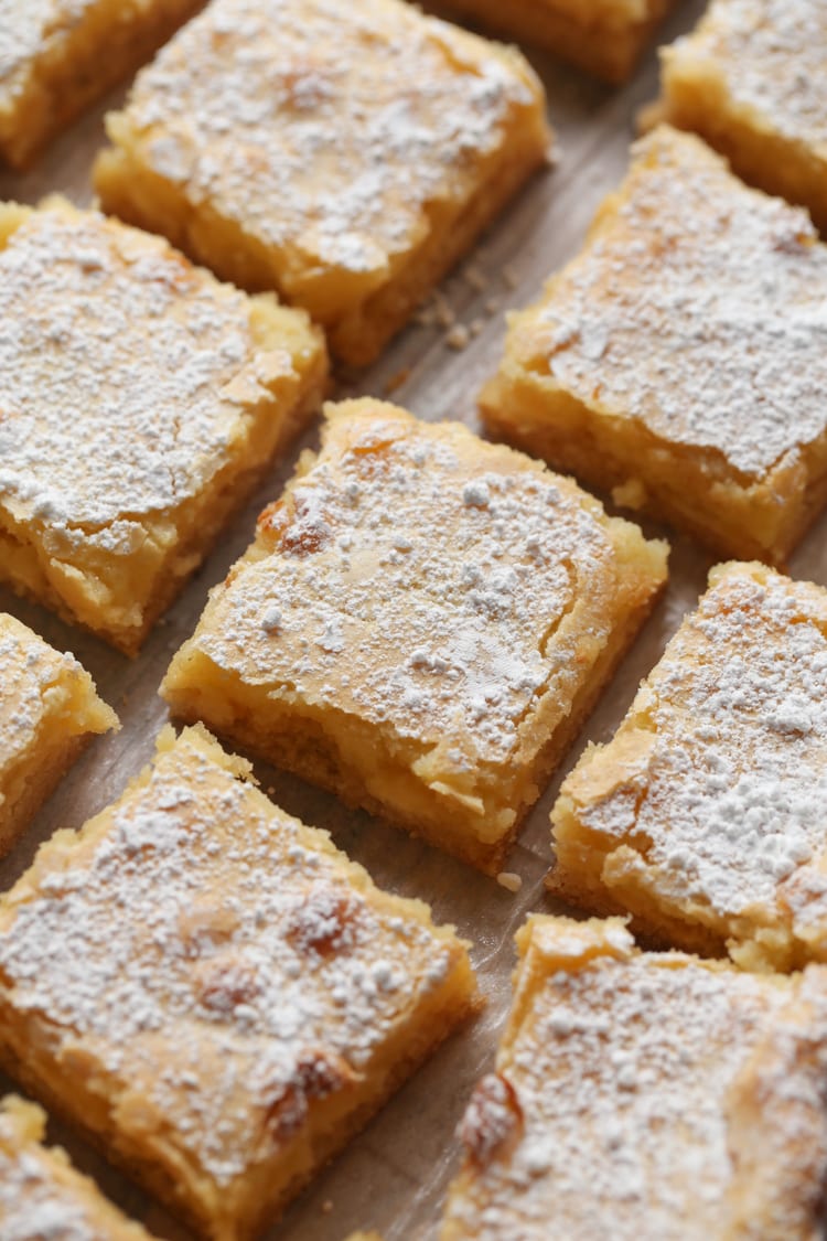 Gooey Butter Bars with powdered sugar dusted on top