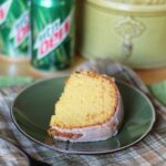 A slice of Mountain Dew cake on a plate