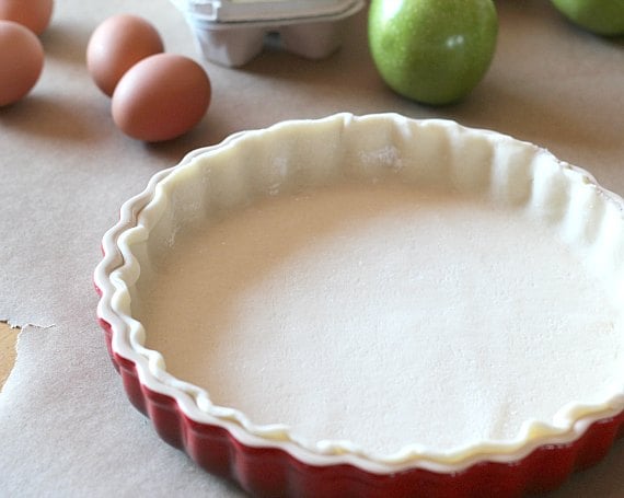 An unbaked pie crust in a pan