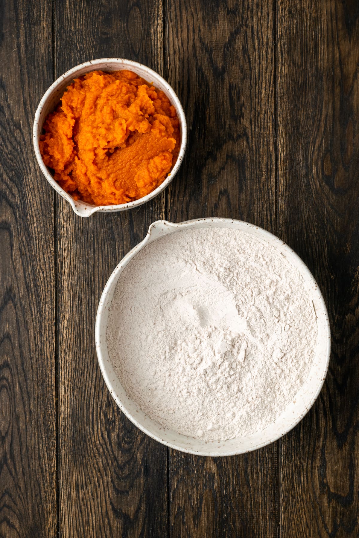 The two ingredients for pumpkin cookies with cake mix.