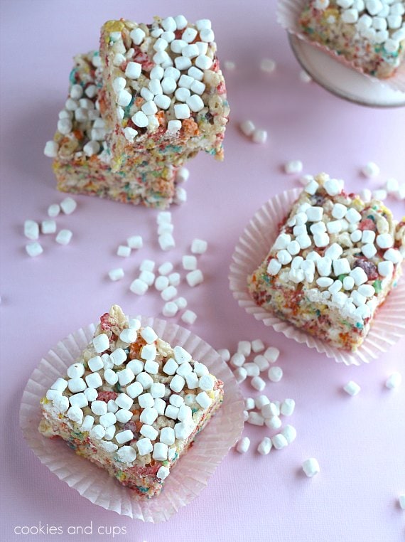 Individual Fruity Pebbles Rice Krispie Treats in muffin wrappers.