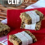 Individual Homemade Clif Snack Bars wrapped in decorating paper with bows.