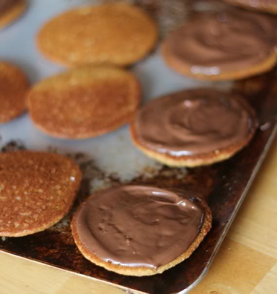 Chocolate filling spread on graham cracker whoopie pie cake halves