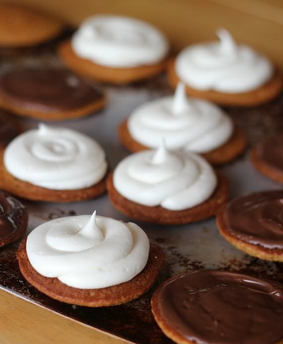 S'mores whoopie pie halves covered in chocolate and marshmallow filling