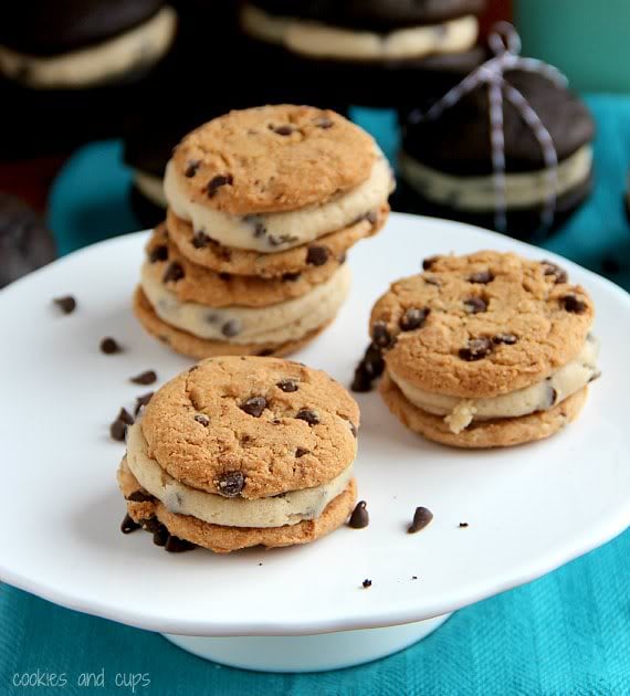 Chocolate chip cookie whoopie pies with chocolate chip cookie dough filling on a plate