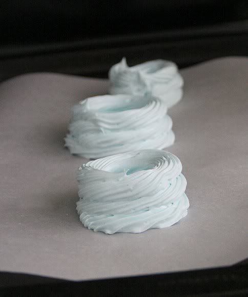 3-layer swirls of blue meringue batter on a baking sheet
