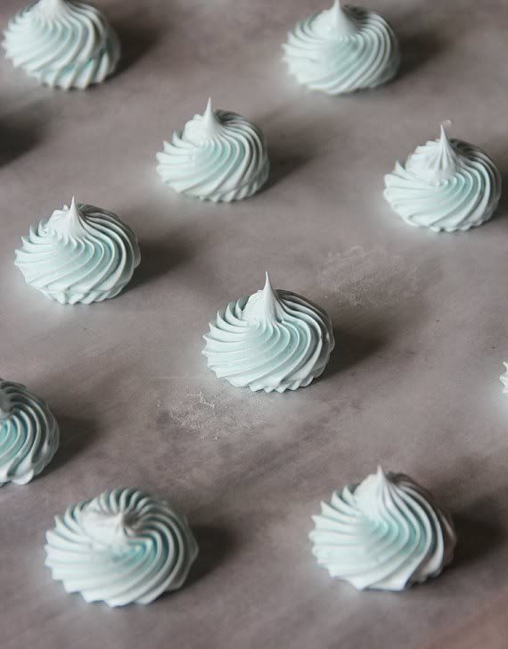 Baked cotton candy meringues on a baking sheet