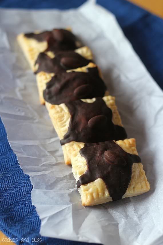 Mini almond joy pop tarts topped with melted chocolate