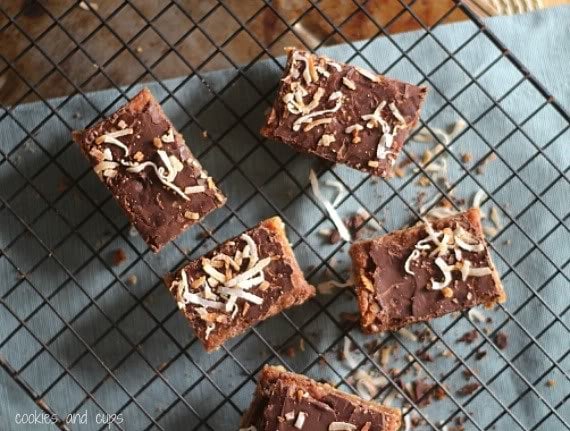 Top view of caramel coconut bars on a cooling rack