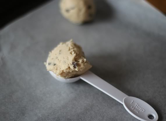 Cookie dough in a measuring spoon