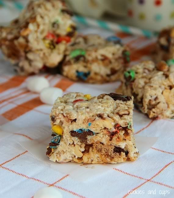 Trail mix krispie treat bars on a tea towel