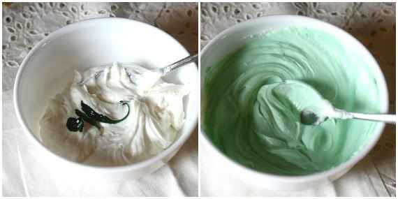 A bowl of white frosting and a bowl of green frosting