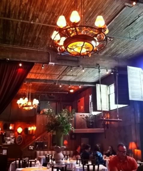 Photo of the interior of a restaurant with rustic decor