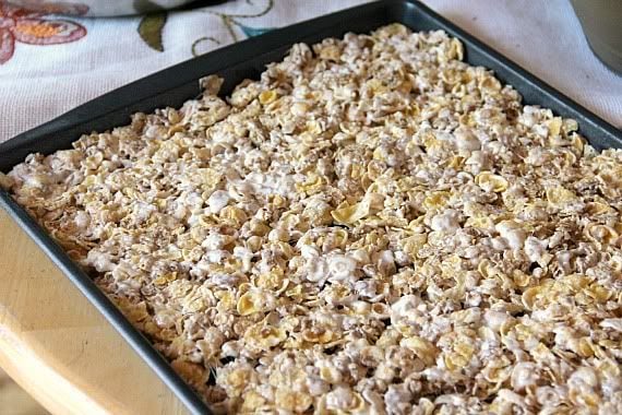 Cereal and marshmallow mixture pressed into a jelly roll pan