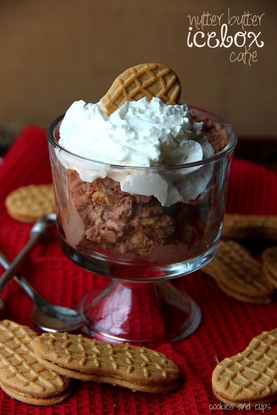 Nutter Butter Icebox Cake in a dessert glass with Nutter Butter cookies scattered around