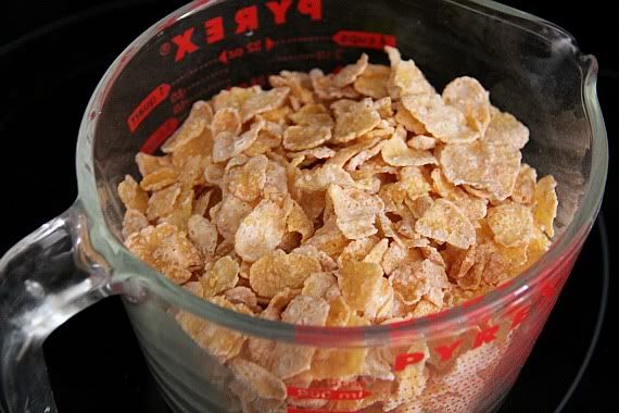 Frosted flakes in a glass measuring cup