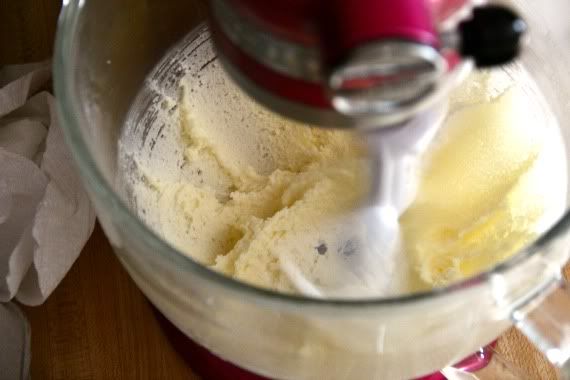 Lemon brownie batter in a stand mixer bowl.