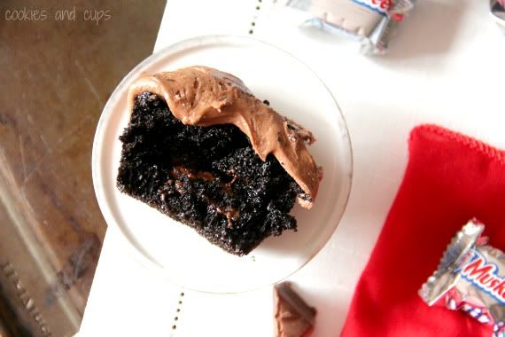 Top view of half of a 3 Musketeers Cupcake on a plate