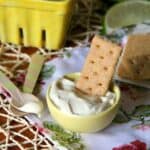 Image of A Graham Cracker Dipped in Key Lime Pie Dip