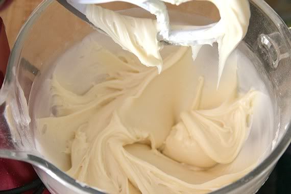 White chocolate fudge mixture in a stand mixer bowl