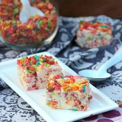 Plate with two pieces of fruity pebble fudge