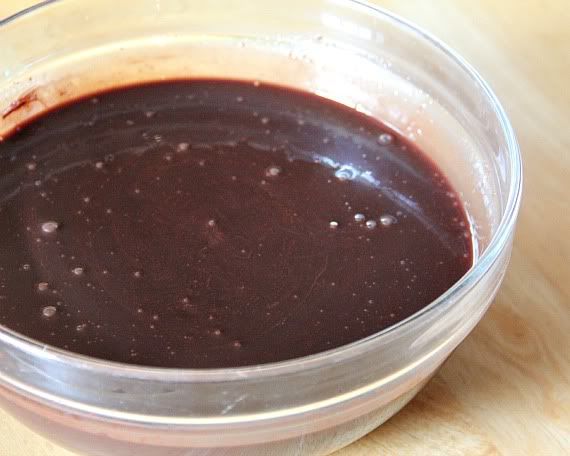 A bowl of melted chocolate mixture in a bowl