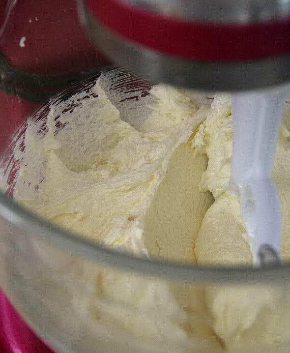 Butter mixture being beaten in a stand mixer bowl