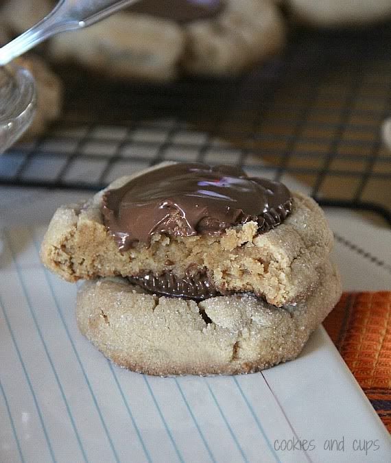 Side view of two stacked peanut butter blossom cookies