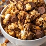 Peanut butter popcorn in a white bowl.