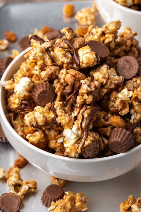 Peanut butter popcorn in a white bowl.