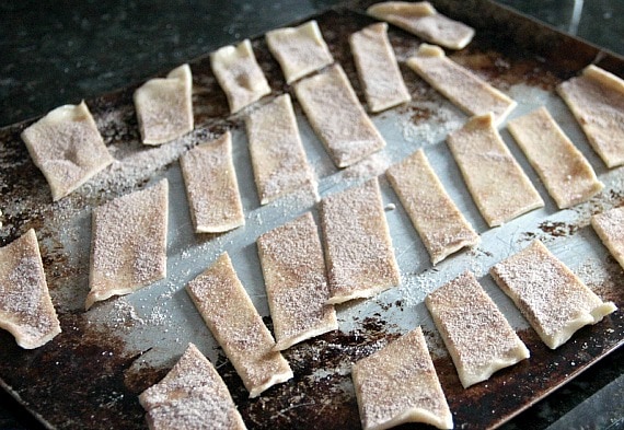 Cinnamon sugar pie crust pieces on a baking sheet