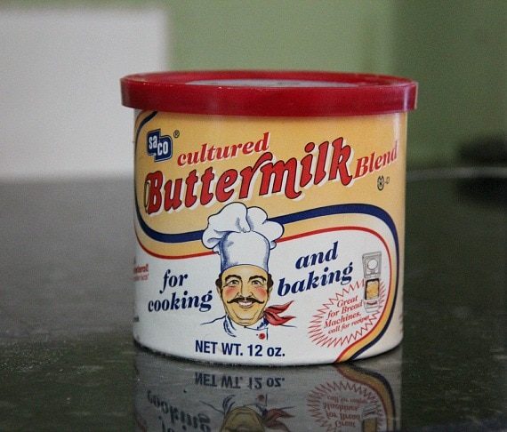 A yellow and white can of powdered cultured buttermilk powder