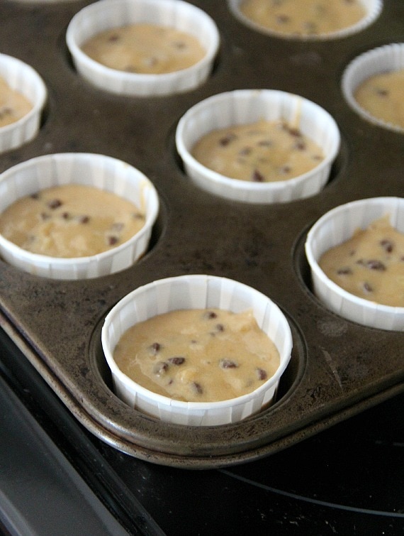 Banana chocolate cupcake batter in muffin cups in a muffin tin