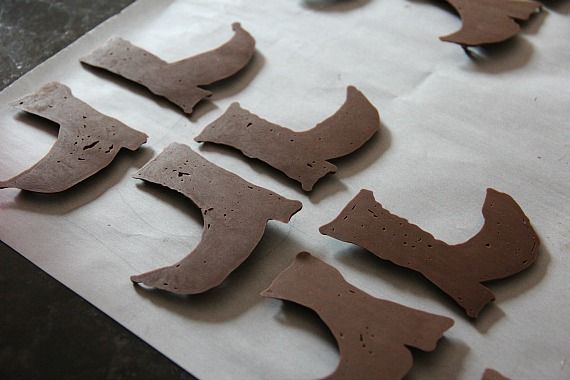 Chocolate witch boots on parchment paper