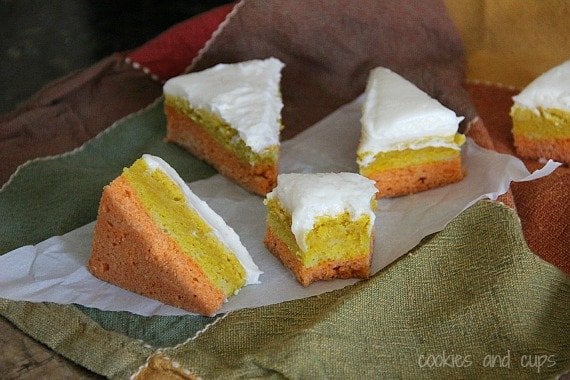 Triangles of Candy Corn Sugar Cookie bars on parchment paper