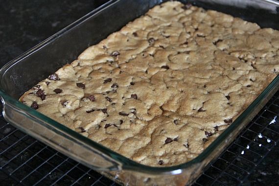 Baked chocolate chip cookie bars in a 9x13 pan