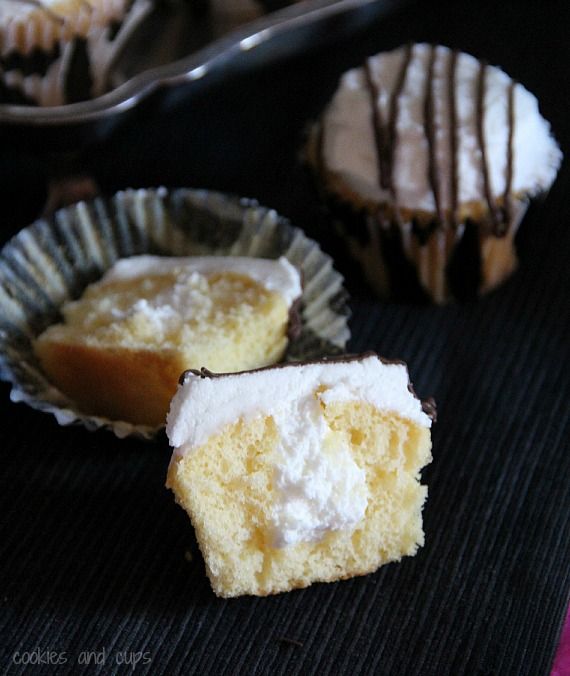 Zebra cake cupcake cut in half to show filling