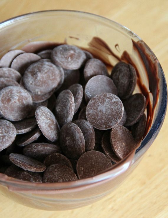 Chocolate melting wafers in a glass bowl