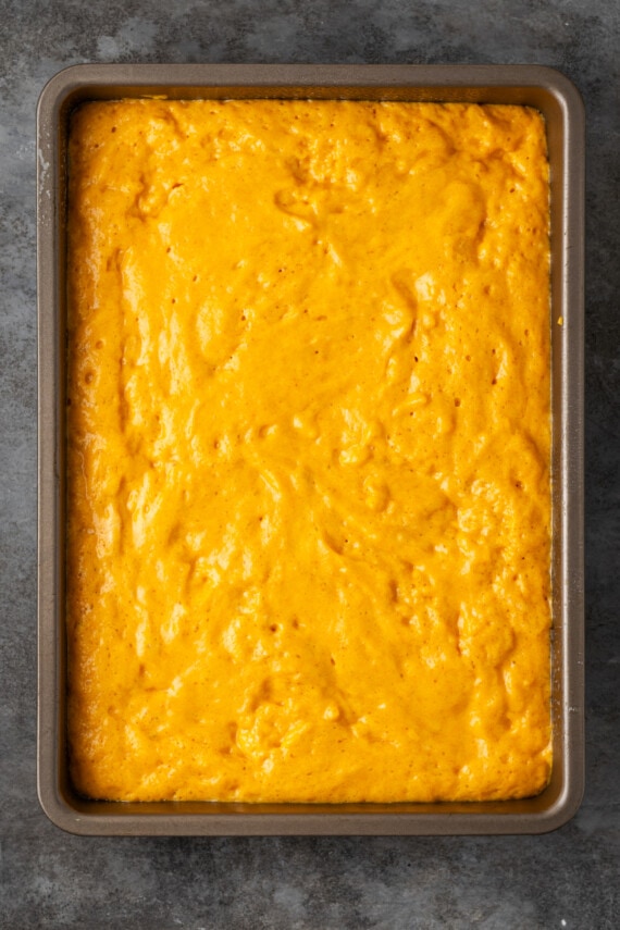 Pumpkin bar batter in a baking pan.