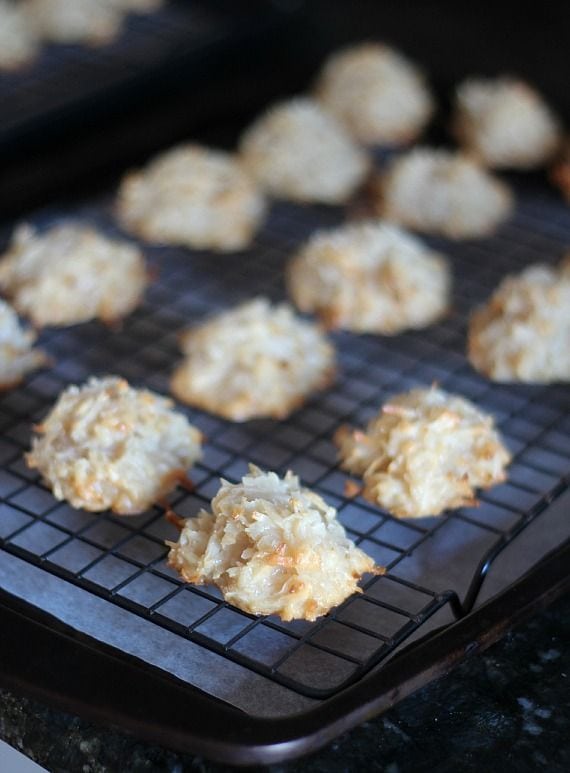 Baked coconut macaroons on a cooling rack