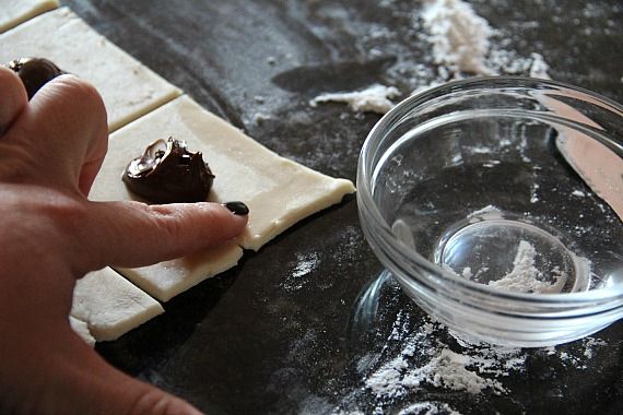 Wetting the Edges of Nutella Pastry Cookies