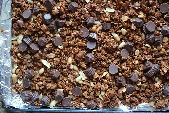 Overhead view of mini peanut butter cup granola on a sheet pan