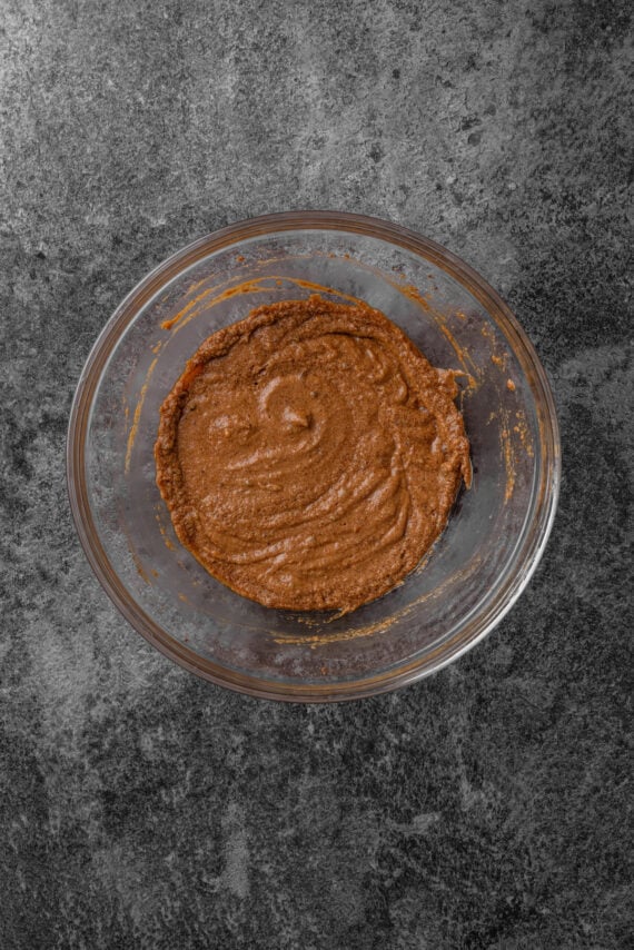 Wet cupcake ingredients in a glass bowl.