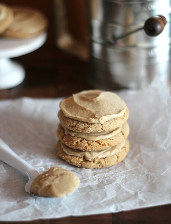 A stack of frosted brown sugar cookies.