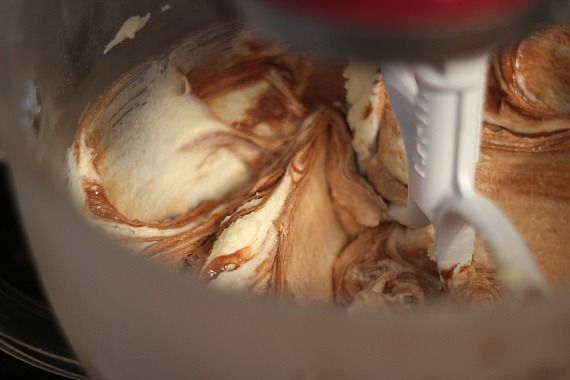 Chocolate and vanilla batter in a stand mixer bowl