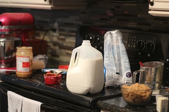 A variety of baking ingredients spread out on the kitchen counter