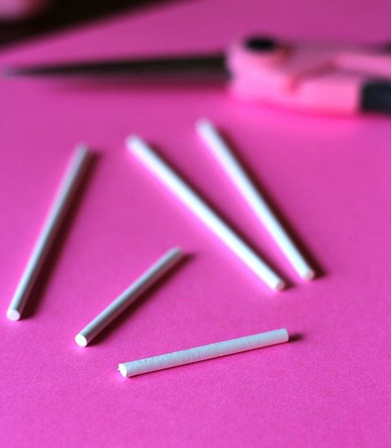 Lollipop sticks on a pink background